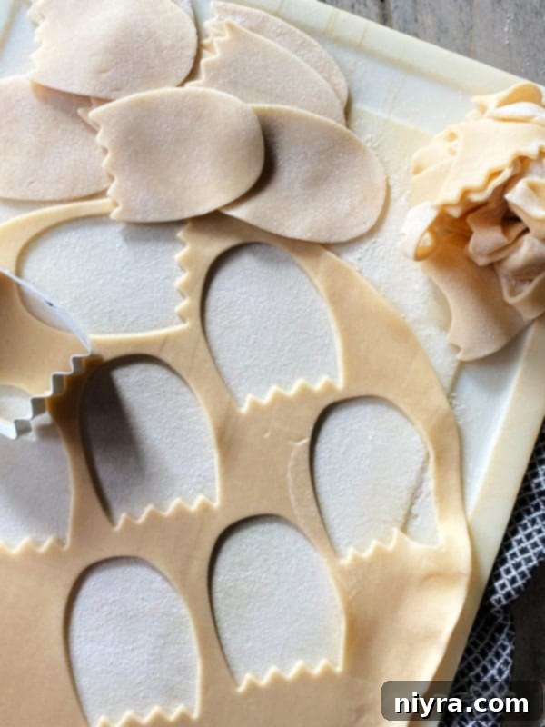 Cutting out pie dough ghosts for pop tarts