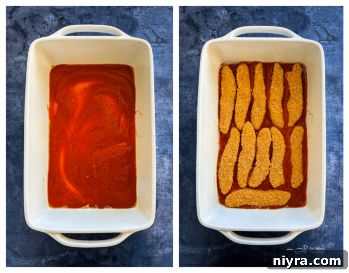 Baking dish with sauce covering the bottom layer