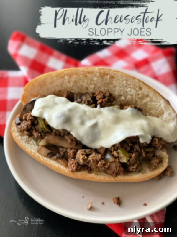 Philly Cheesesteak Sloppy Joes 9 Finished Philly Cheesesteak Sloppy Joe on a plate