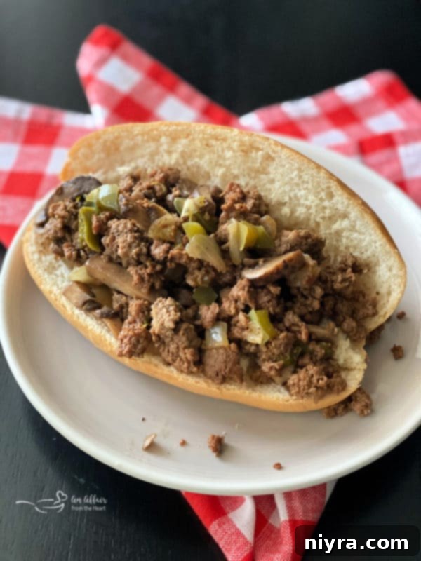 Philly Cheesesteak Sloppy Joes 6 Philly Cheesesteak Sloppy Joe with cheese sauce