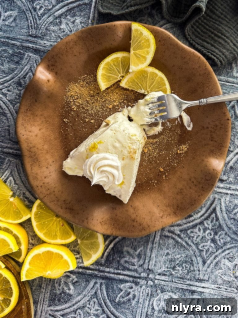 Close-up of the creamy lemon filling in a No-Bake Lemon Icebox Pie.