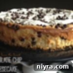 Side view of cheesecake with text 'chocolate chip cheesecake'