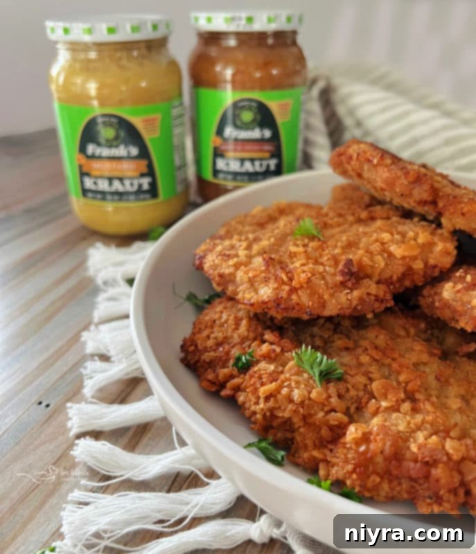 Crispy Breaded Pork Cutlets 13 Breaded pork cutlets served with Frank's Kraut