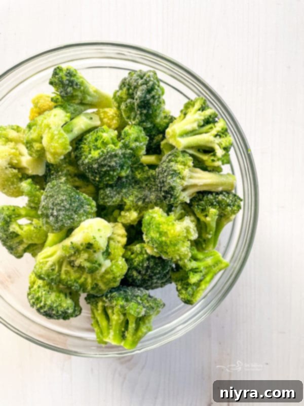 A bowl of fresh, chopped broccoli florets, ready for the stuffing.