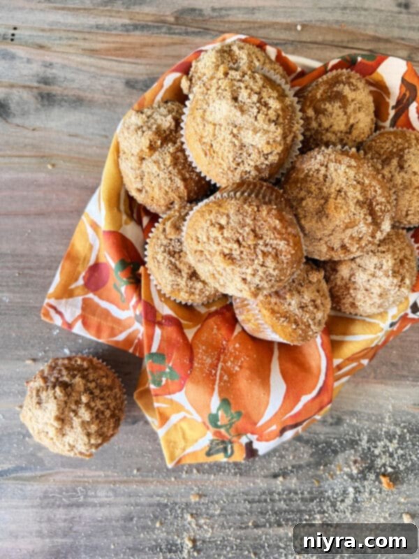 Pumpkin Spice Banana Muffins on a cooling rack
