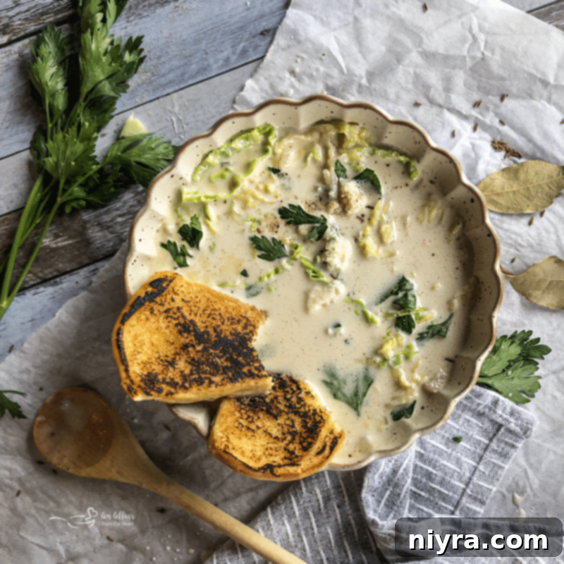A serving of creamy cabbage and blue cheese soup, ready to be enjoyed.
