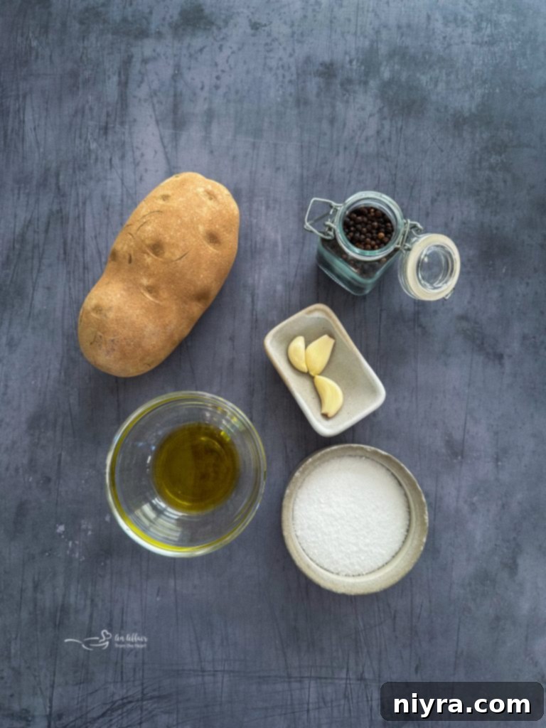 Prepped potato slices on a baking sheet