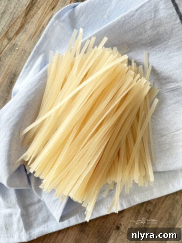 Dry rice noodles on a kitchen towel