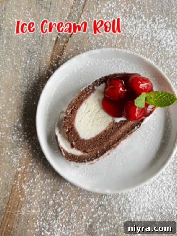 Ice cream Roll Cake on a white plate, beautifully sliced and ready to eat