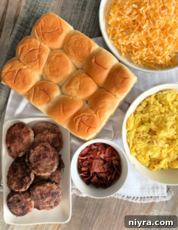 rolls, cheese, eggs, bacon, sausage for sliders
