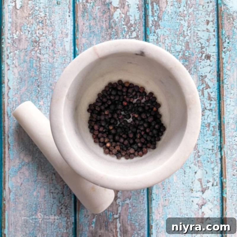 DIY Lemon Pepper Perfection 6 Dried black peppercorns in a spice grinder