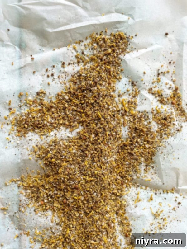 DIY Lemon Pepper Perfection 9 Finished homemade lemon pepper seasoning in a small bowl