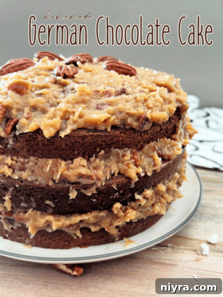 A close-up of a tall, beautiful German Chocolate Cake featuring rich chocolate layers and abundant coconut pecan frosting, ready to be cut into slices.
