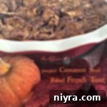 Cozy Pumpkin Cinnamon Swirl French Toast Bake 2 French toast bake in a red casserole dish with text "pumpkin cinnamon swirl baked french toast"