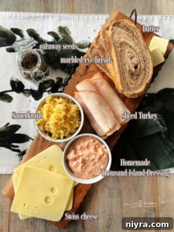 Ingredients for a Turkey Reuben Sandwich laid out