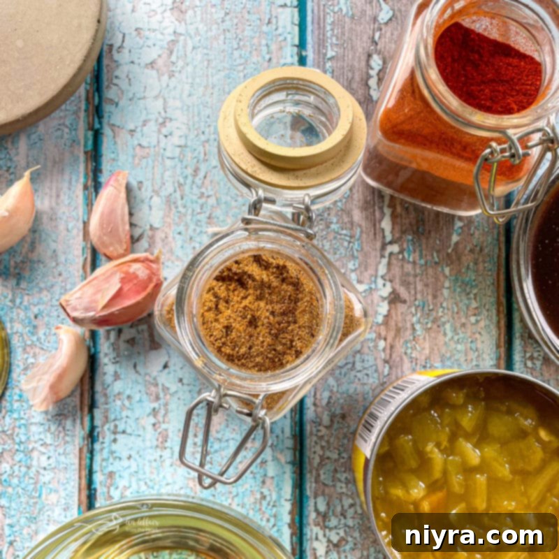 A collection of fresh tortilla soup ingredients, including diced tomatoes, onions, green chilies, and spices.