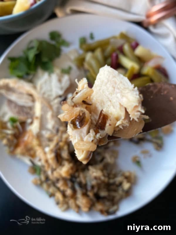 Golden Baked Chicken with Savory Wild Rice Stuffing 3 Perfectly roasted chicken with crispy skin, sliced and served with wild rice stuffing.