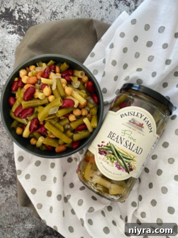 Golden Baked Chicken with Savory Wild Rice Stuffing 4 A jar of Paisley Farm Five Bean Salad.