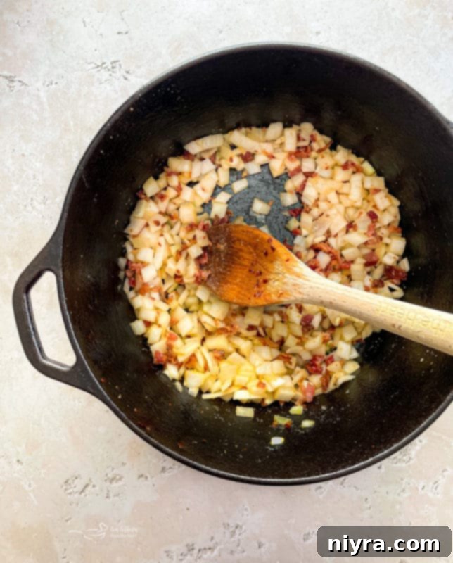 Sauté bacon, onions and garlic in Zuppa