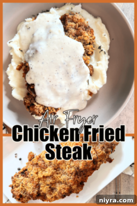 Air Fryer Chicken Fried Steak plated with mashed potatoes and gravy.