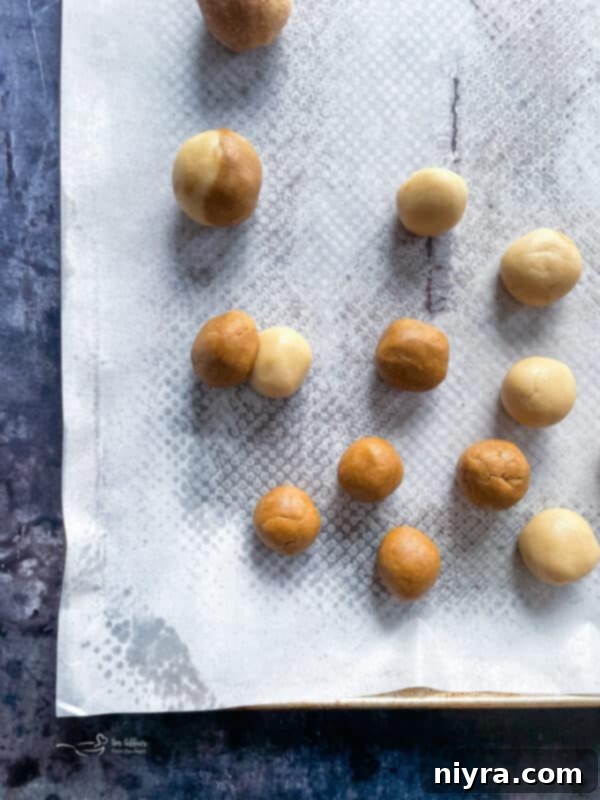 The process of combining two different cookie doughs into one unique Gingerdoodle cookie ball.