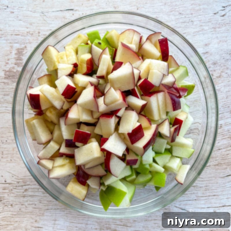 diced apples in glass bowl
