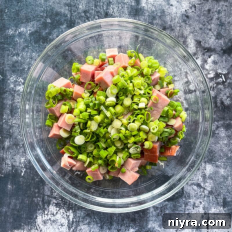 Close-up of a 9x13 inch glass baking pan lightly coated with non-stick cooking spray.