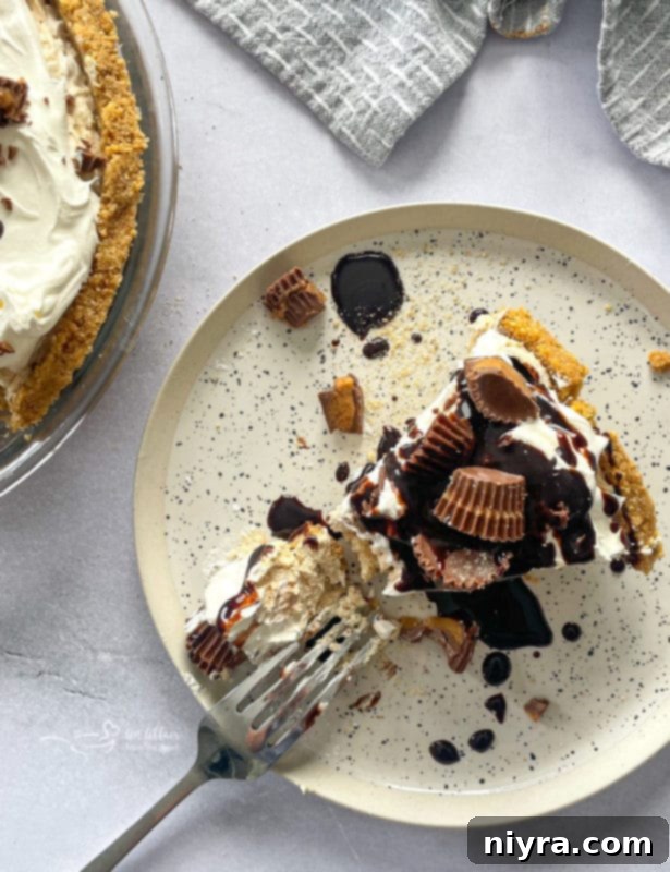Slice of No-Bake Peanut Butter Pie with a Fork