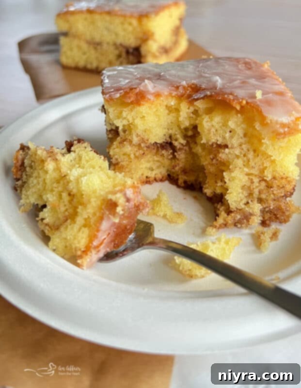 Honey Bun Cake on a Plate with a Fork