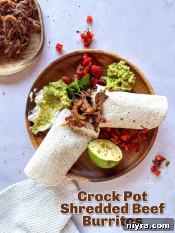 A stunning hero shot of a perfectly wrapped Crock Pot Shredded Beef Burrito, ready to be enjoyed, with a blurred background suggesting a warm, inviting mealtime.