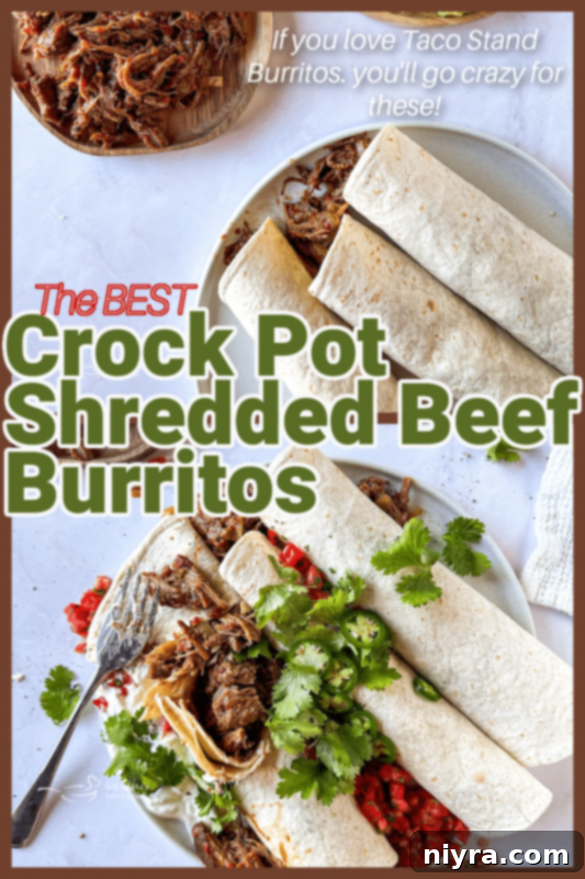 A beautifully presented Crock Pot Shredded Beef Burrito, ready to eat, highlighting the simplicity and deliciousness of the homemade meal.