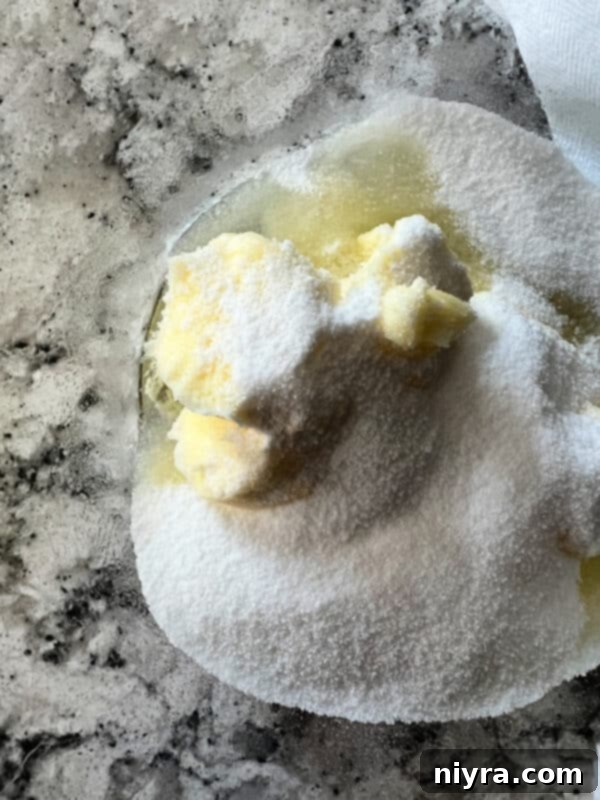 Lavender Shortbread and Lavender Strawberry Dream 11 Butter and sugar creaming together in a stand mixer, forming a light and fluffy mixture.