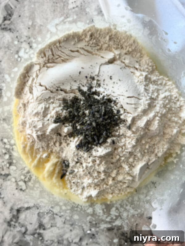 Lavender Shortbread and Lavender Strawberry Dream 12 Dry ingredients (flour and lavender) being folded into the creamed butter and sugar mixture.