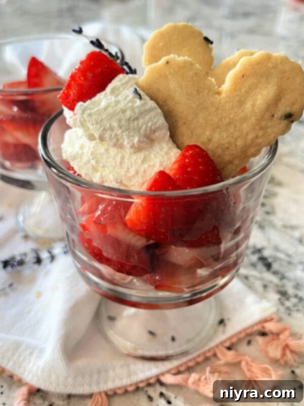 Lavender Shortbread and Lavender Strawberry Dream 21 A stunning dessert featuring lavender shortbread, whipped cream, and lavender strawberries layered in a glass.