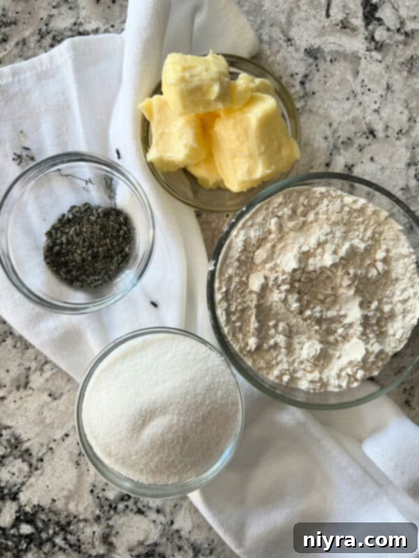 Lavender Shortbread and Lavender Strawberry Dream 7 A close-up of a small bowl filled with dried lavender buds, ready to be used in a recipe.