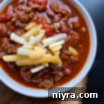 Close up of Three bean chili in a white bowl