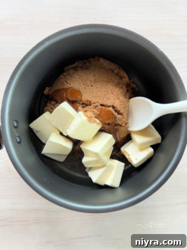 Ultimate Homemade Caramel Chocolate Nut Popcorn 12 Ingredients for caramel sauce melting in a saucepan over medium heat