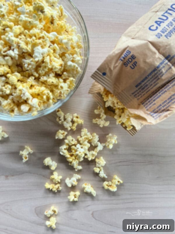 Ultimate Homemade Caramel Chocolate Nut Popcorn 8 Two bags of microwave popcorn, a key ingredient for convenience