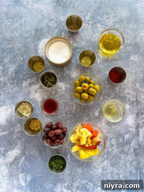 New Orleans Iconic Muffuletta 4 Muffuletta sandwich cut in half, revealing layers of ingredients