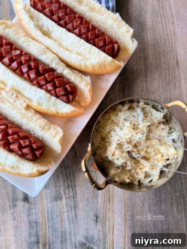 Smoky Dogs with Zesty Kraut 14 Finished smoked hot dogs in buns, with kraut