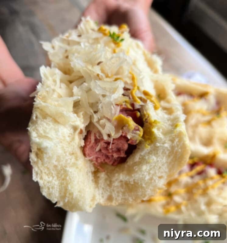 Smoky Dogs with Zesty Kraut 16 Delicious smoked hot dog in a bun with kraut