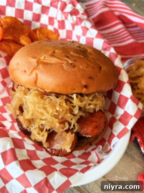 Smoky Dogs with Zesty Kraut 19 BBQ Smoked Sausage Sandwiches on a bun with kraut