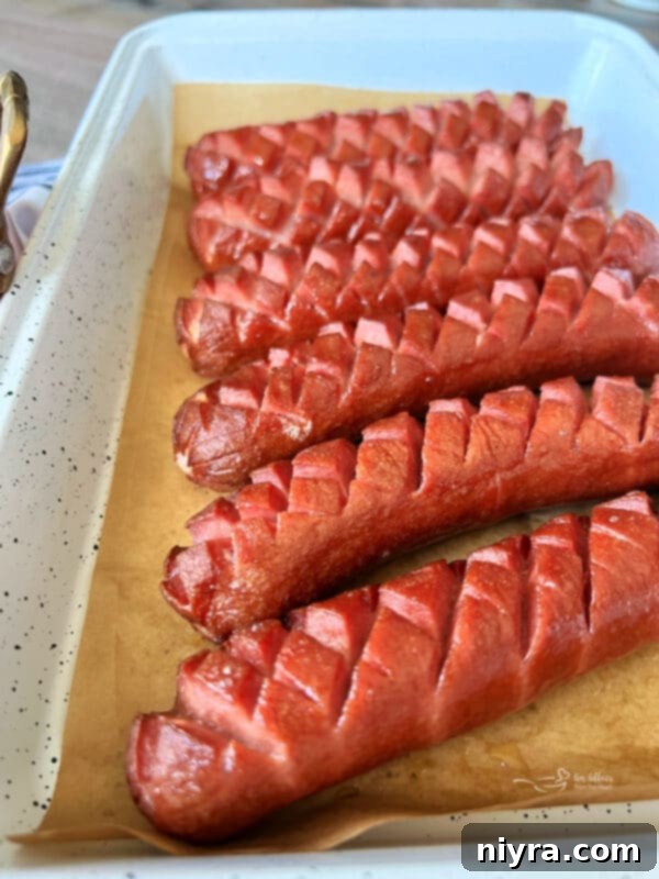 Smoky Dogs with Zesty Kraut 6 Smoked hot dogs and sauerkraut on a pellet grill