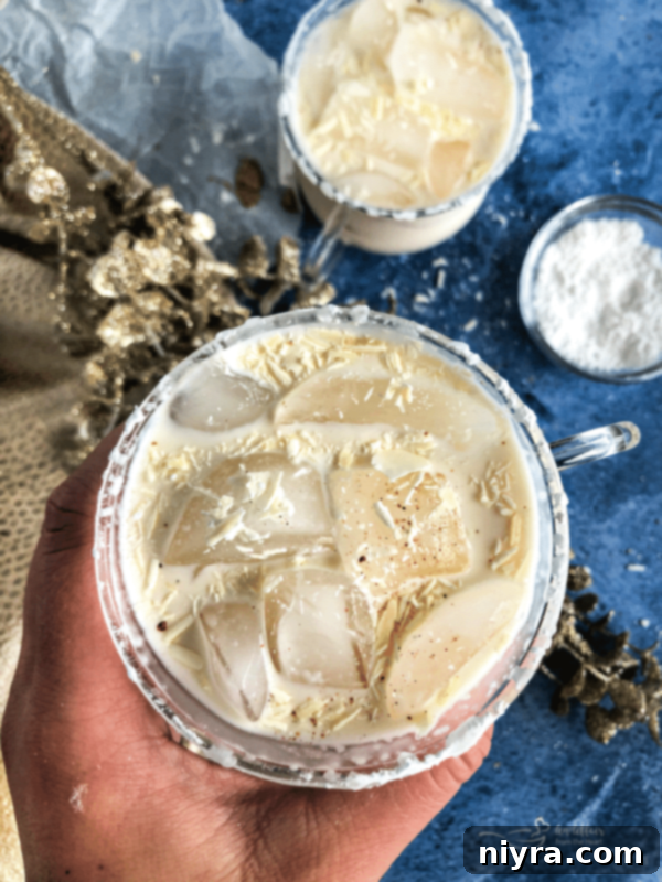 White Russian Cocktail with white chocolate close up