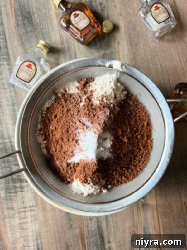 Adding vanilla extract and whiskey to cookie dough