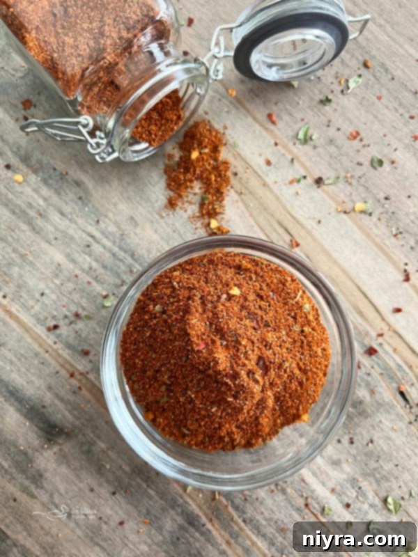 A jar of homemade taco seasoning ready to be used