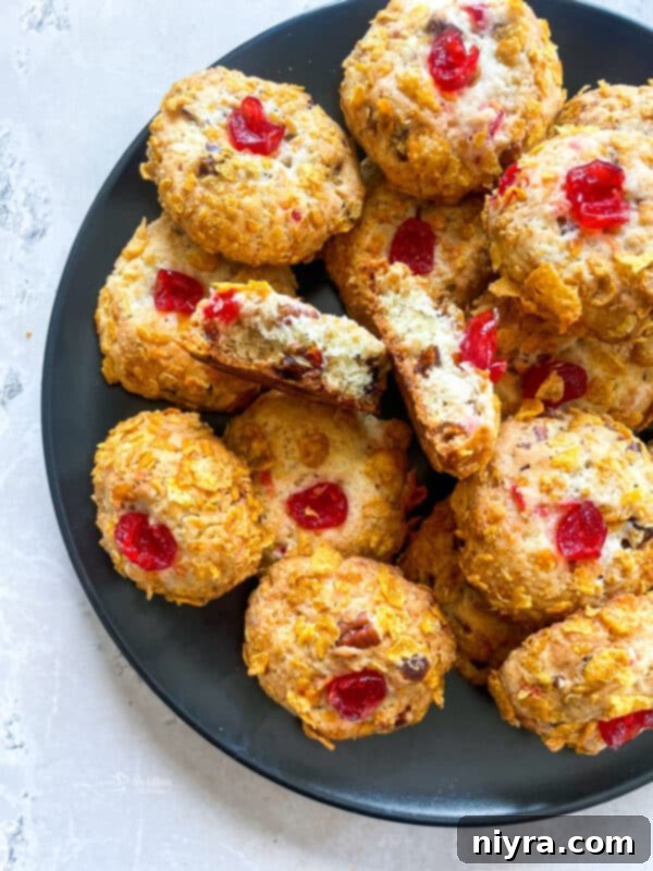 Classic Cherry Wink Cookies with a maraschino cherry on top, showcasing their delightful appearance.