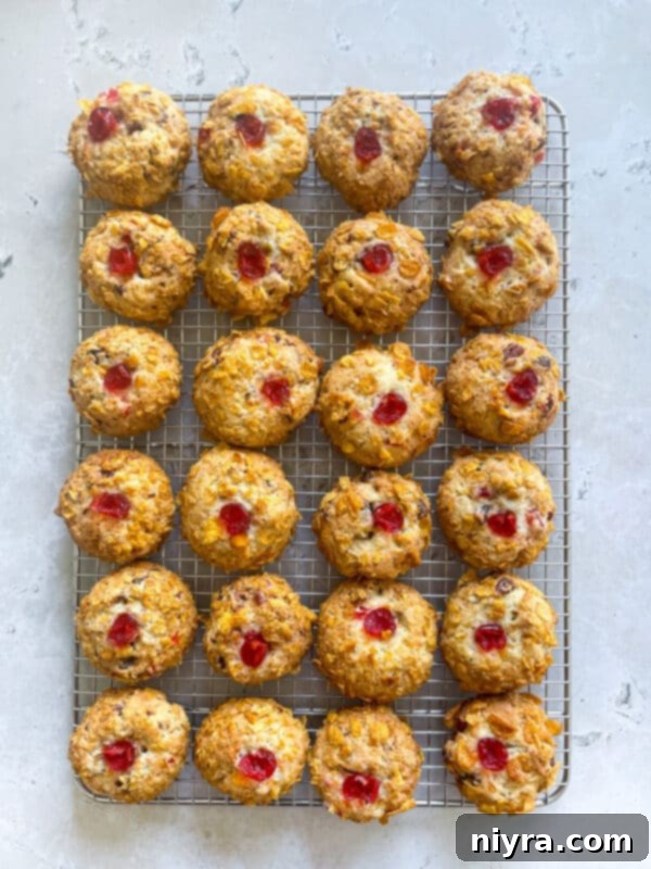 Baked Cherry Wink Cookies on a cooling rack.