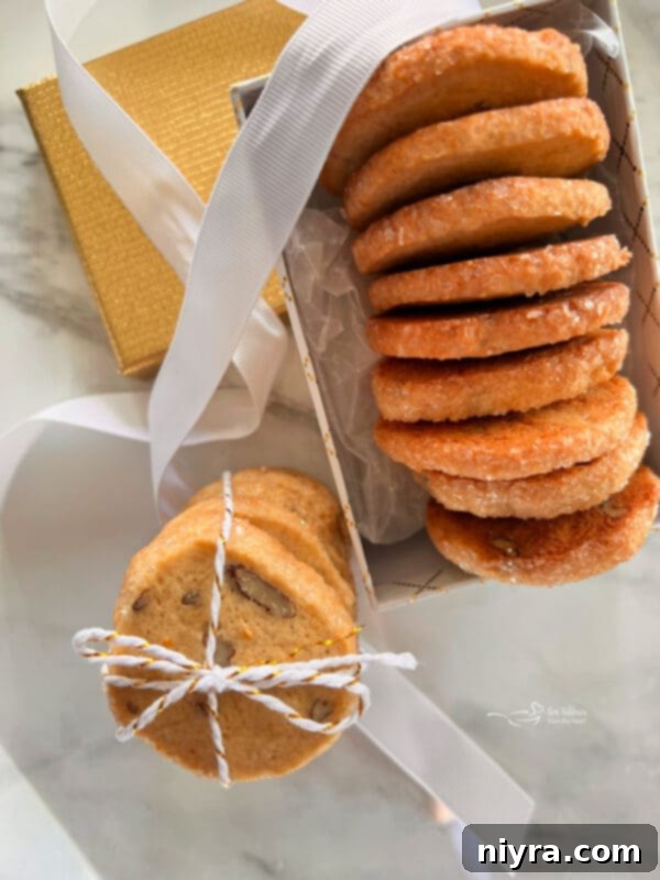 Beautifully arranged Orange Ginger Refrigerator Cookies on a festive plate, garnished with orange zest and sugar crystals.