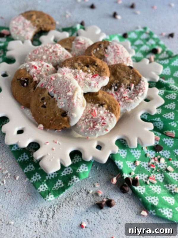 Peppermint Dipped Chocolate Chip Cookies on snowflake plate